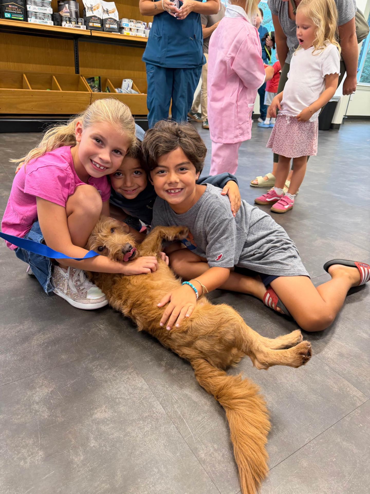 Kids with a dog